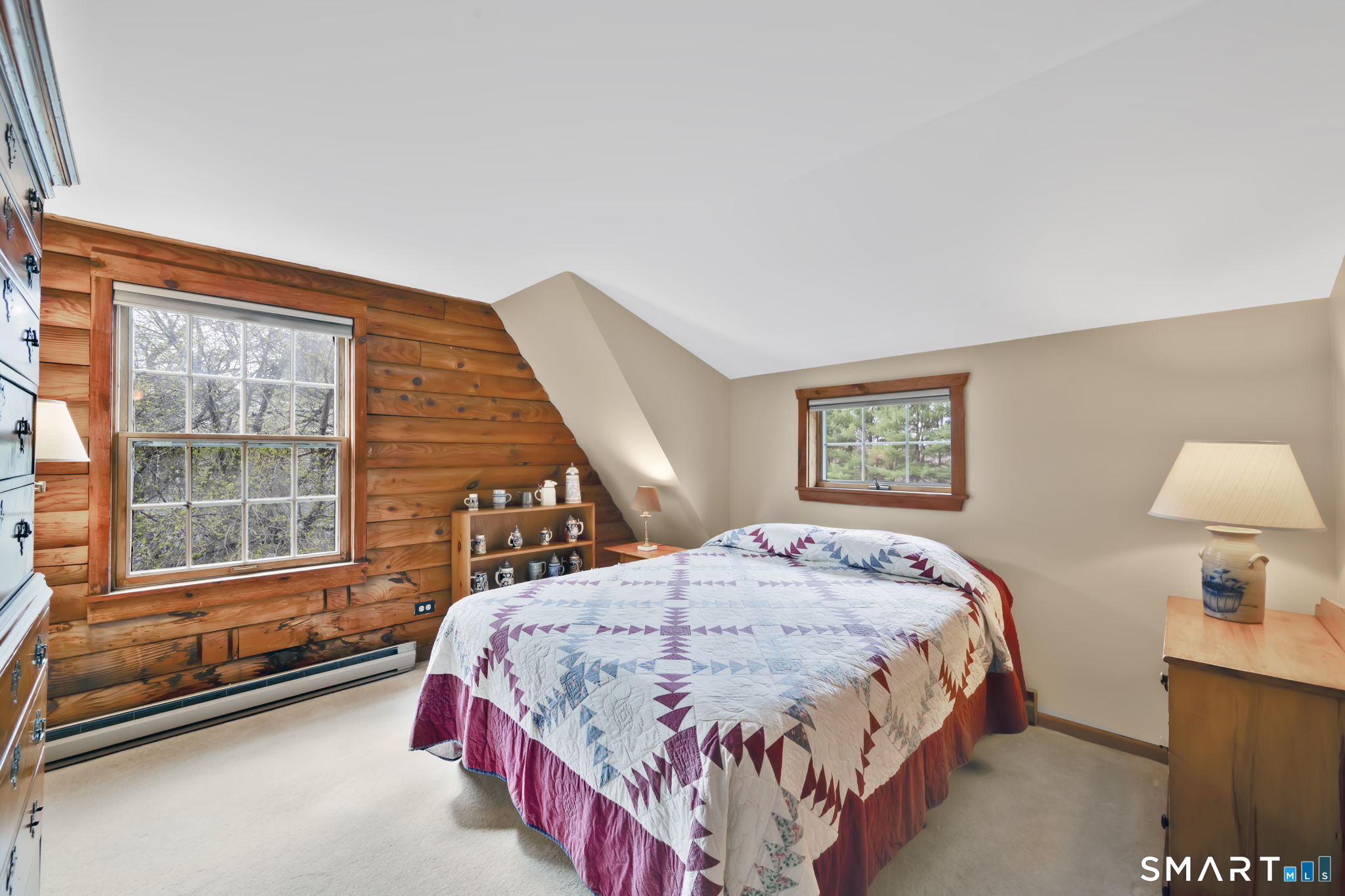 260 West Street Hebron, CT 06248 - Photo 24 of 40 a bedroom with a bed and a window