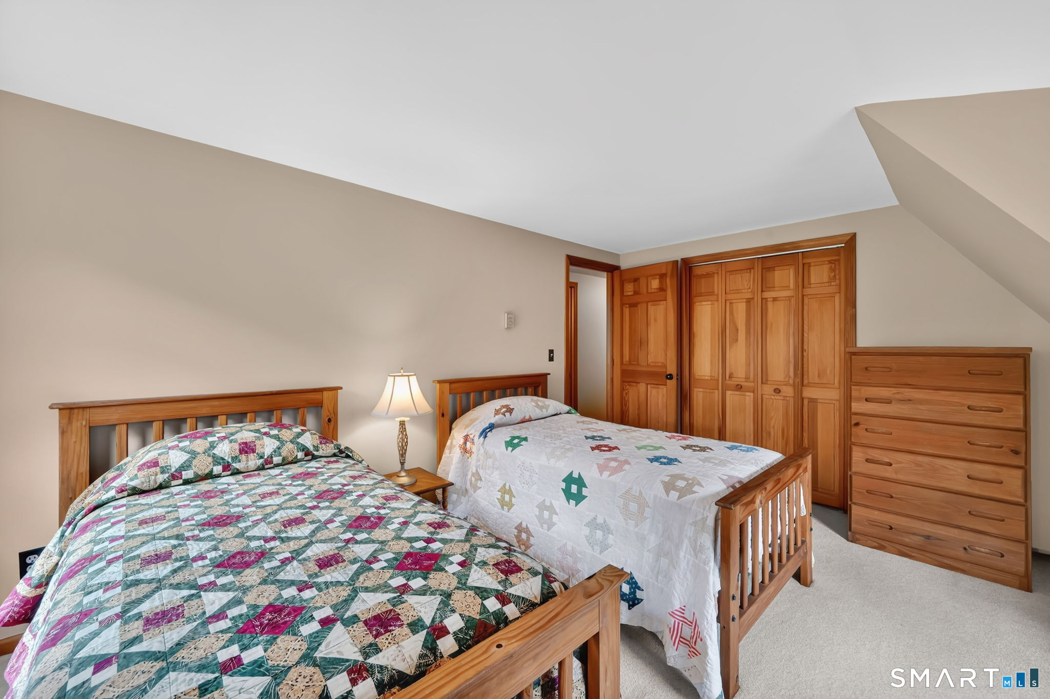 260 West Street Hebron, CT 06248 - Photo 27 of 40 a bedroom with a bed and a window