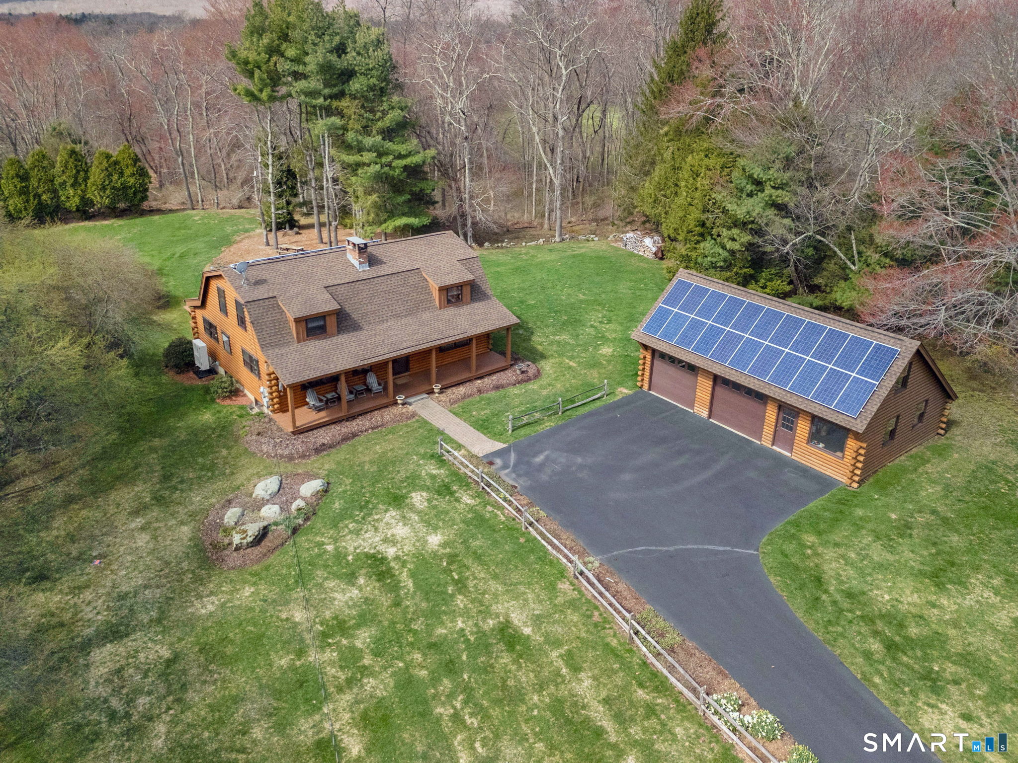 260 West Street Hebron, CT 06248 - Photo 3 of 40 an aerial view of a house with garden space and street view