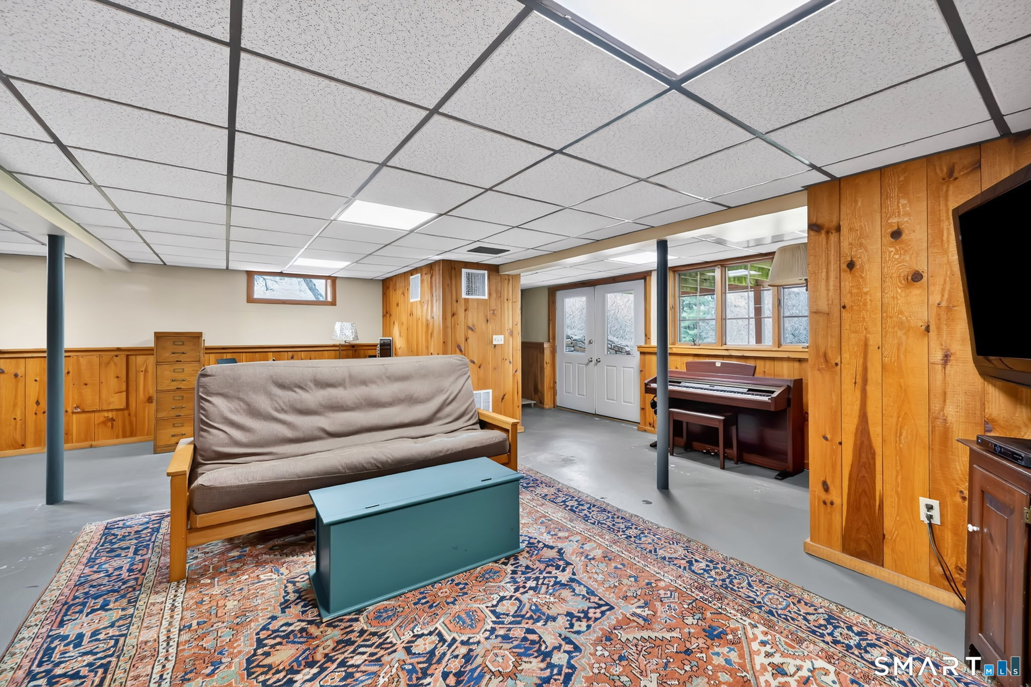 260 West Street Hebron, CT 06248 - Photo 33 of 40 a bedroom with furniture and a rug
