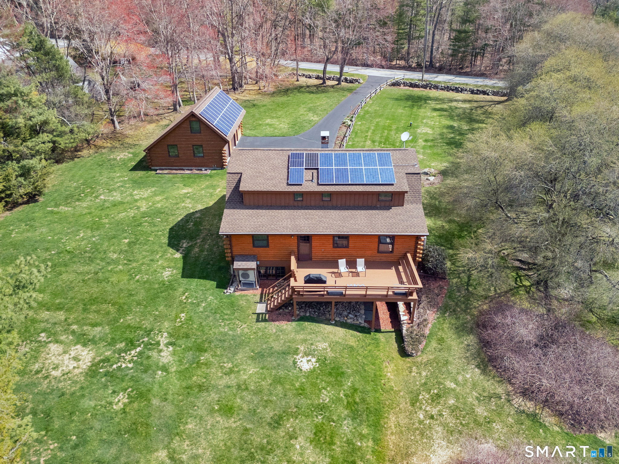 260 West Street Hebron, CT 06248 - Photo 40 of 40 a view of a house with a yard porch and sitting area