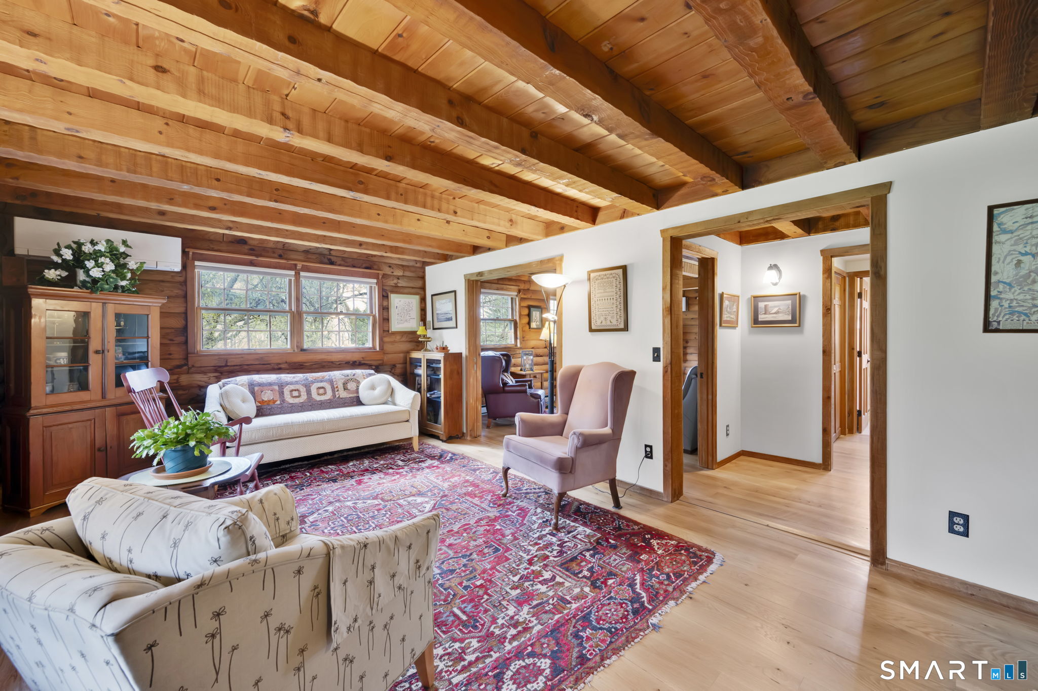 260 West Street Hebron, CT 06248 - Photo 5 of 40 a living room with furniture a rug and a window