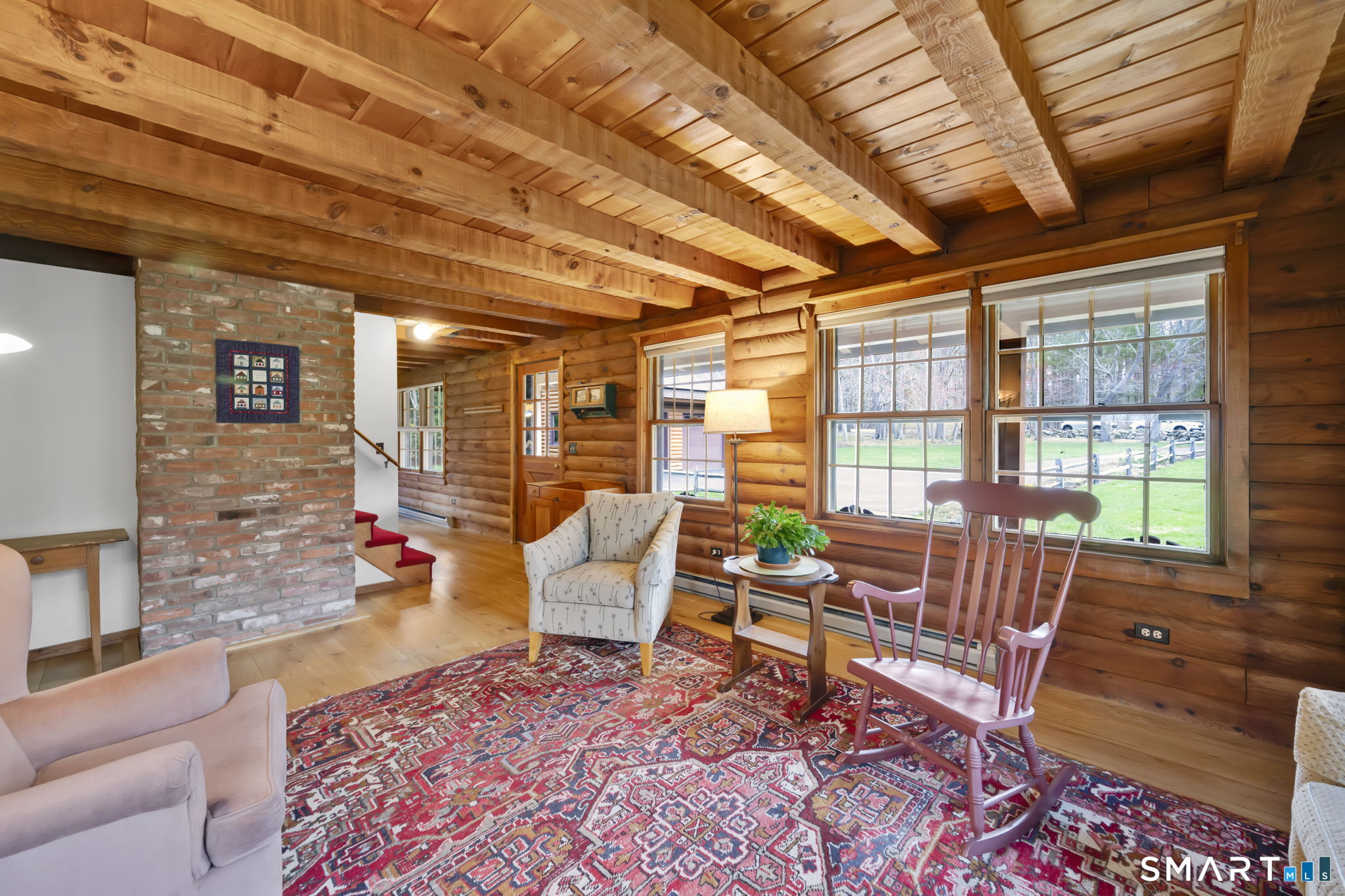260 West Street Hebron, CT 06248 - Photo 7 of 40 a living room with furniture and a large window