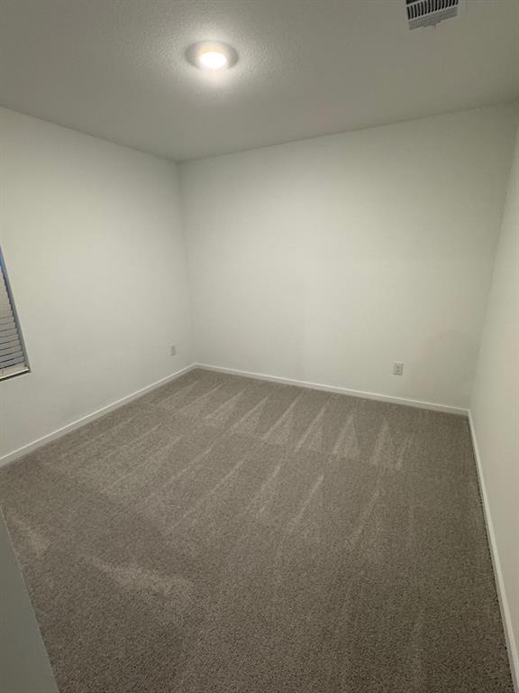 7809 Bent Gale Road Pilot Point, TX 76258 - Photo 8 of 17 an empty room with a bench