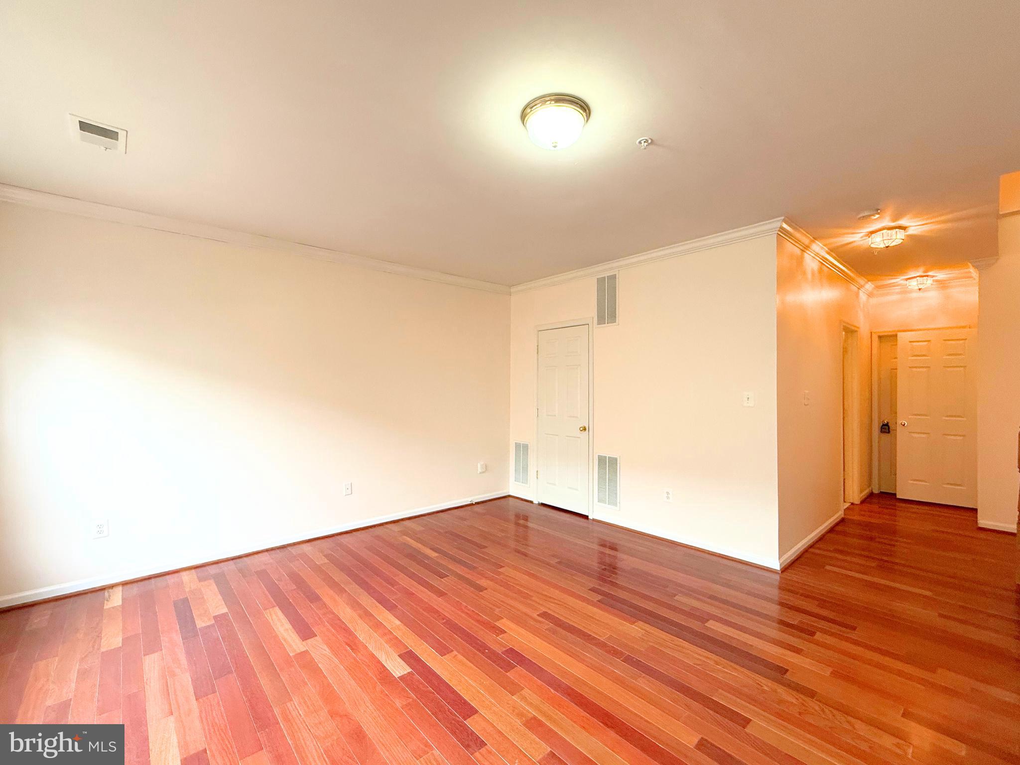13429 Rising Sun Lane Germantown, MD 20874 - Photo 17 of 27 a view of empty room with wooden floor
