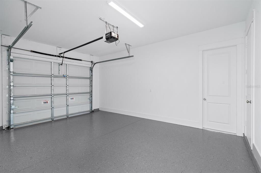 667 Southwest Cleveland Avenue, Unit 2 Stuart, FL 34994 - Photo 10 of 10 an empty room with a empty space