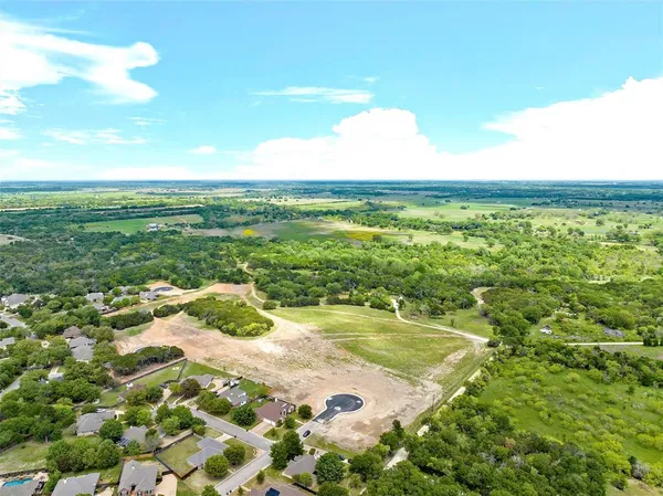 a view of a swimming pool with an outdoor space