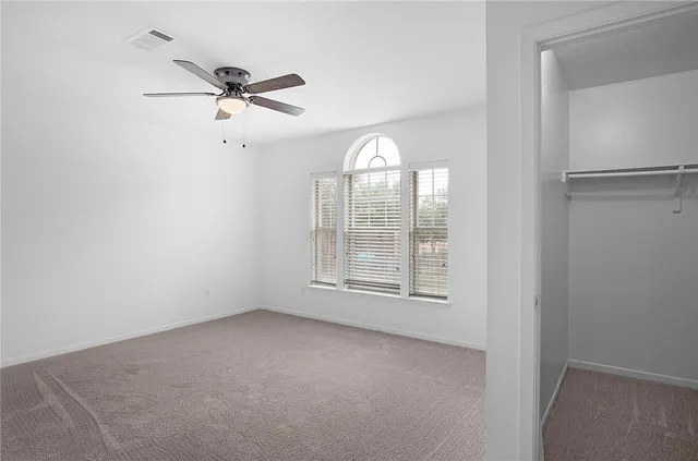 an empty room that has a window