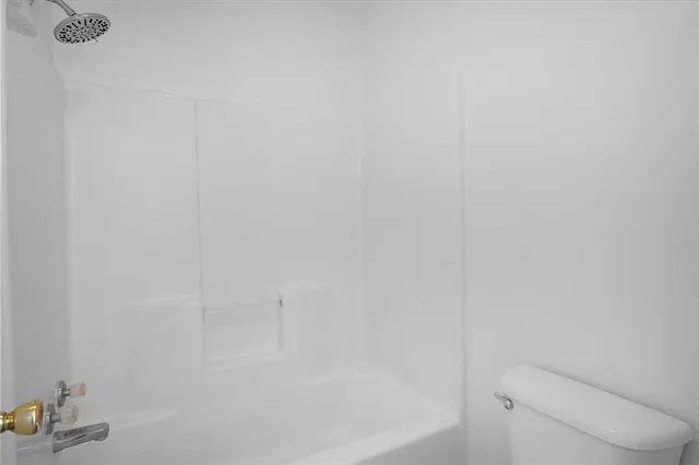 a close up of a bathtub in bathroom