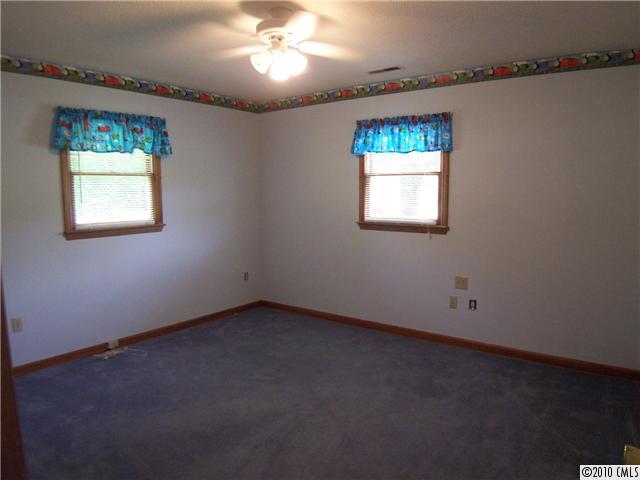 409 Robinson Creek Road Bostic, NC 28018 - Photo 6 of 9 an empty room with a window