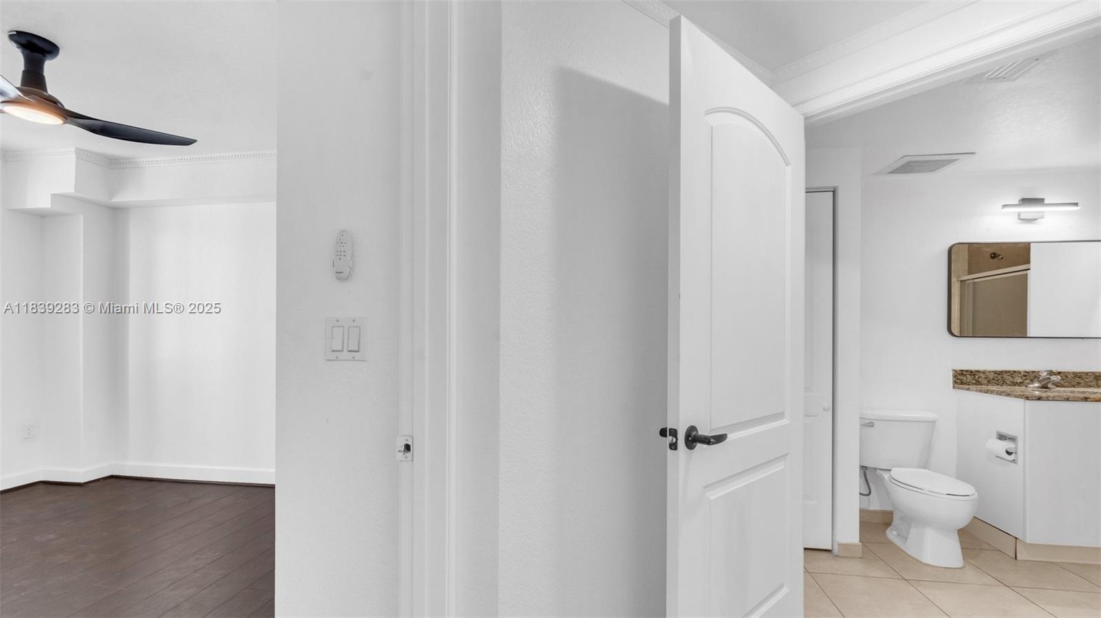 1830 Radius Drive, Unit 405 Hollywood, FL 33020 - Photo 22 of 28 a bathroom with a toilet sink and a shower