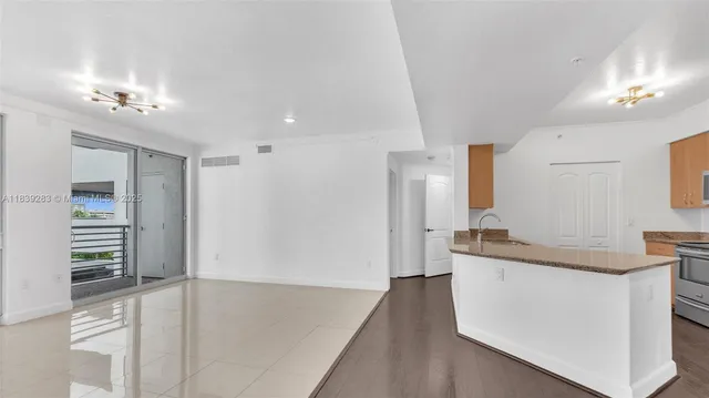 a view of a kitchen cabinets and a sink