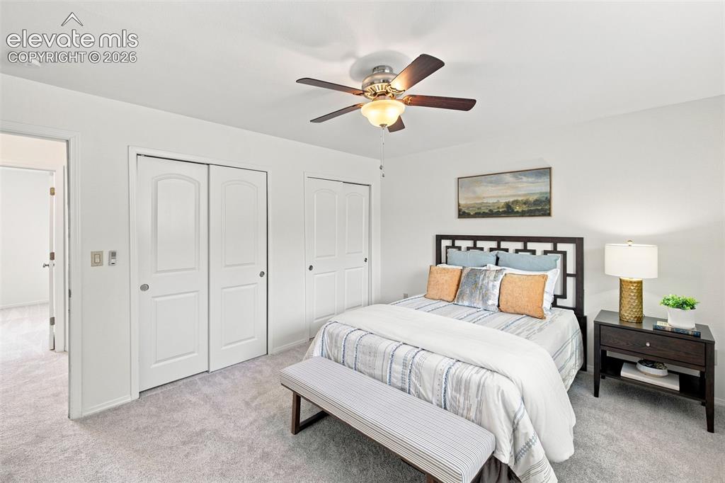 1239 Suncrest Way Colorado Springs, CO 80906 - Photo 27 of 46 Primary bedroom - main level