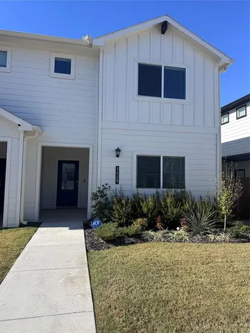 a front view of house with yard