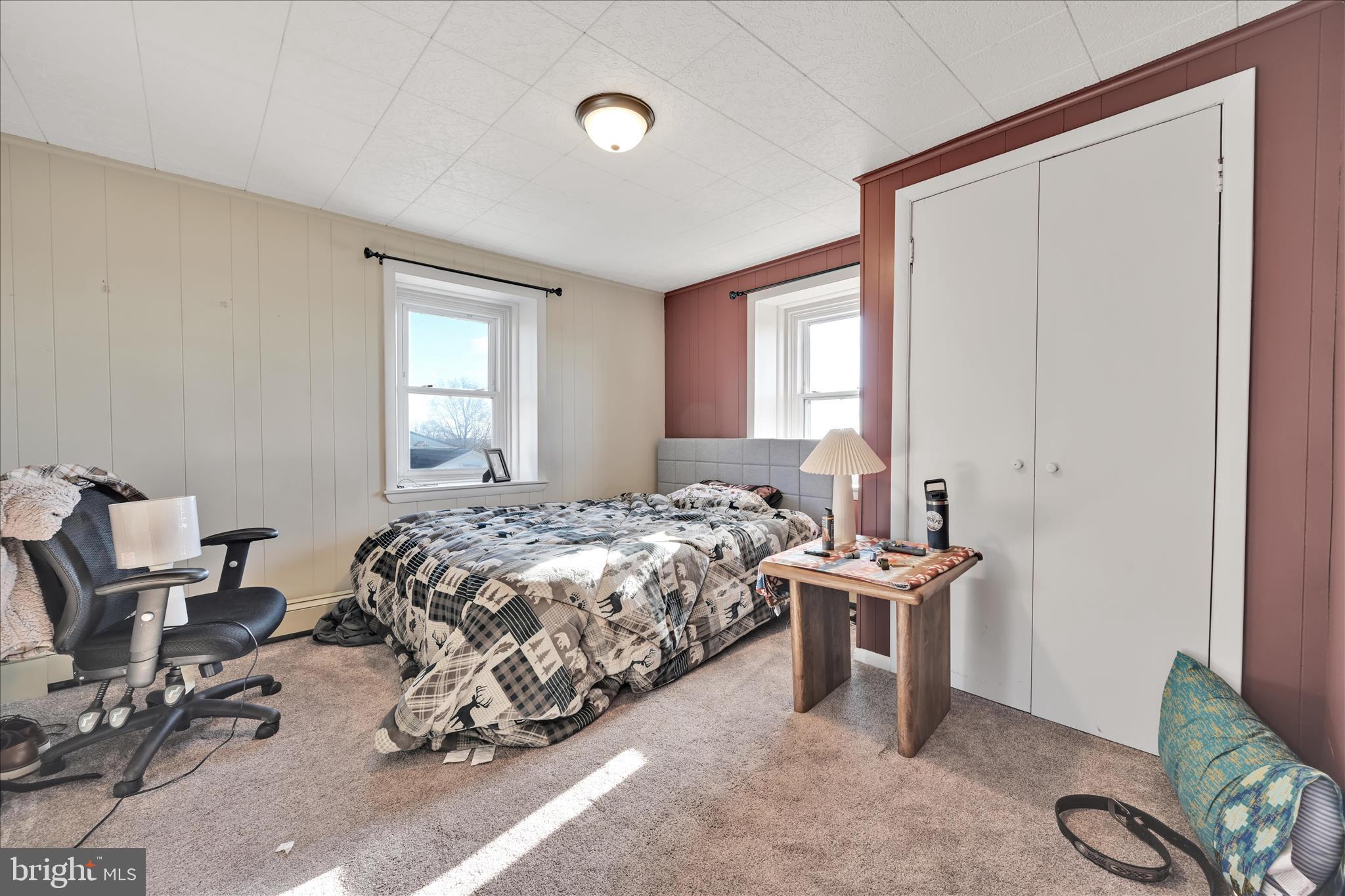 116 Mill Road Bernville, PA 19506 - Photo 16 of 62 a bed room with a bed and a chair