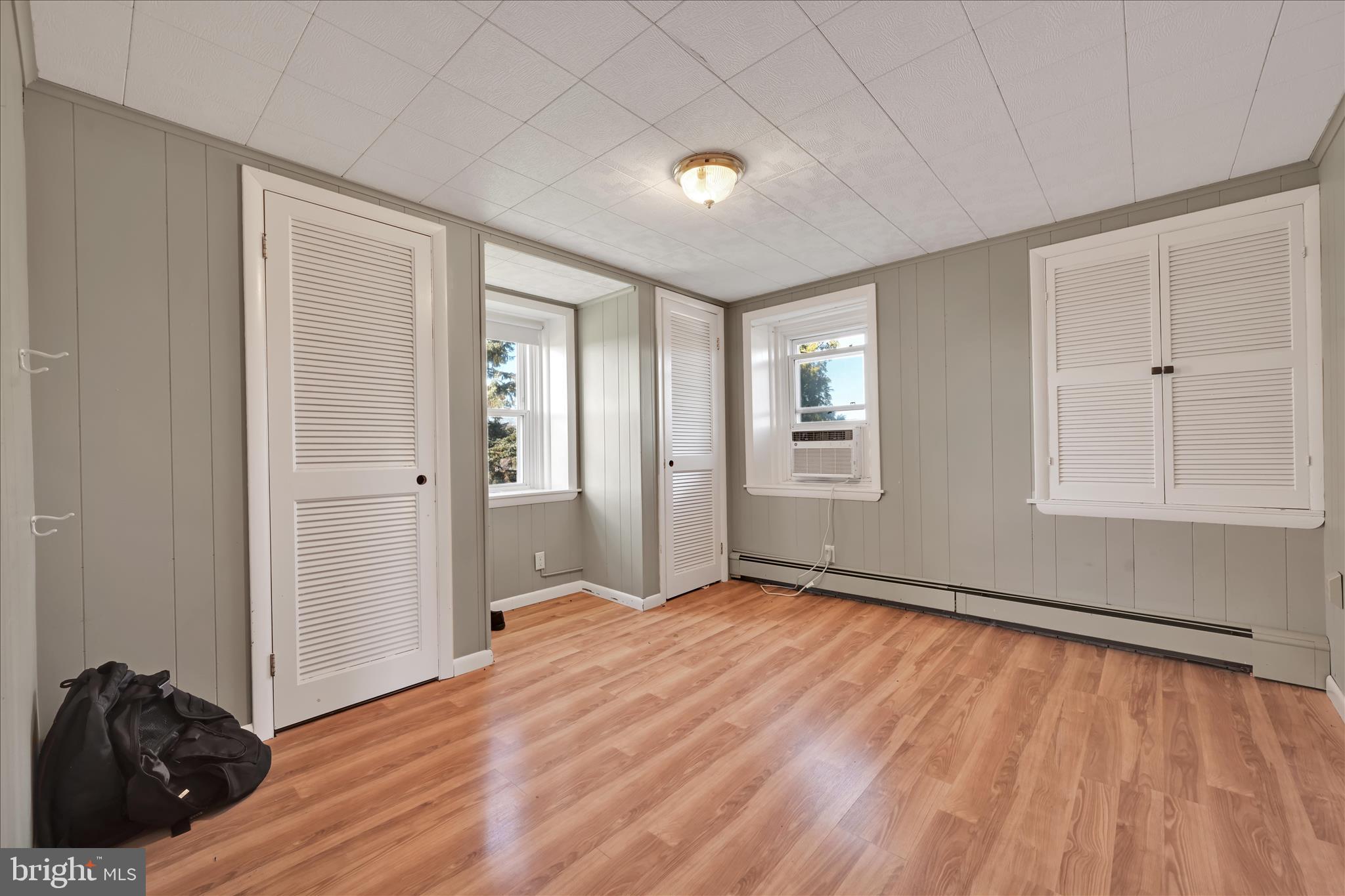 116 Mill Road Bernville, PA 19506 - Photo 20 of 62 a view of empty room with wooden floor and fan