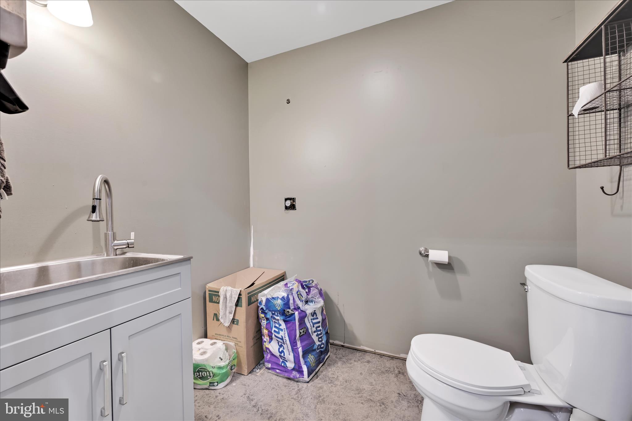 116 Mill Road Bernville, PA 19506 - Photo 48 of 62 a bathroom with a sink a toilet and mirror