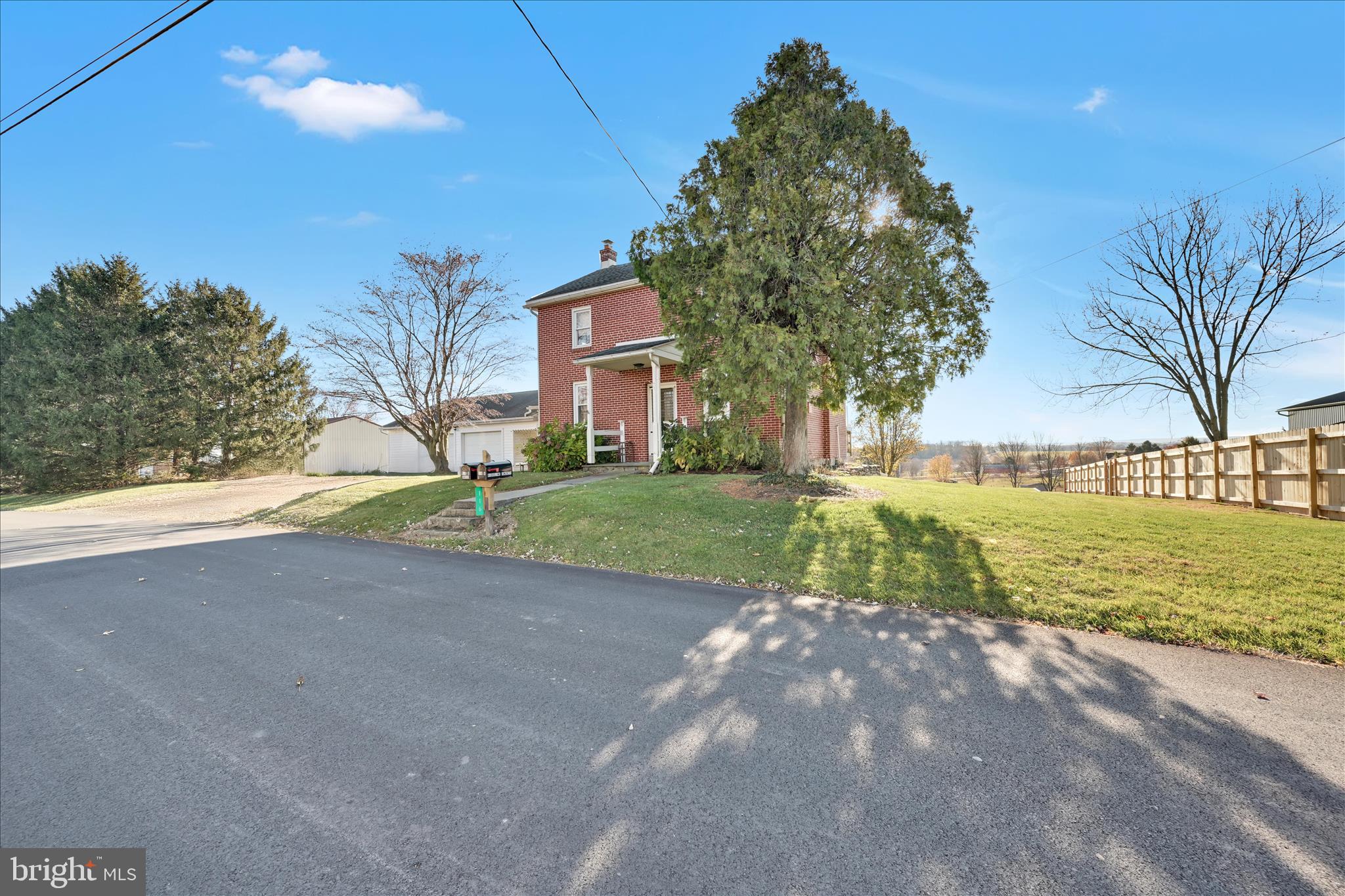 116 Mill Road Bernville, PA 19506 - Photo 6 of 62 a view of a house with a yard and garage