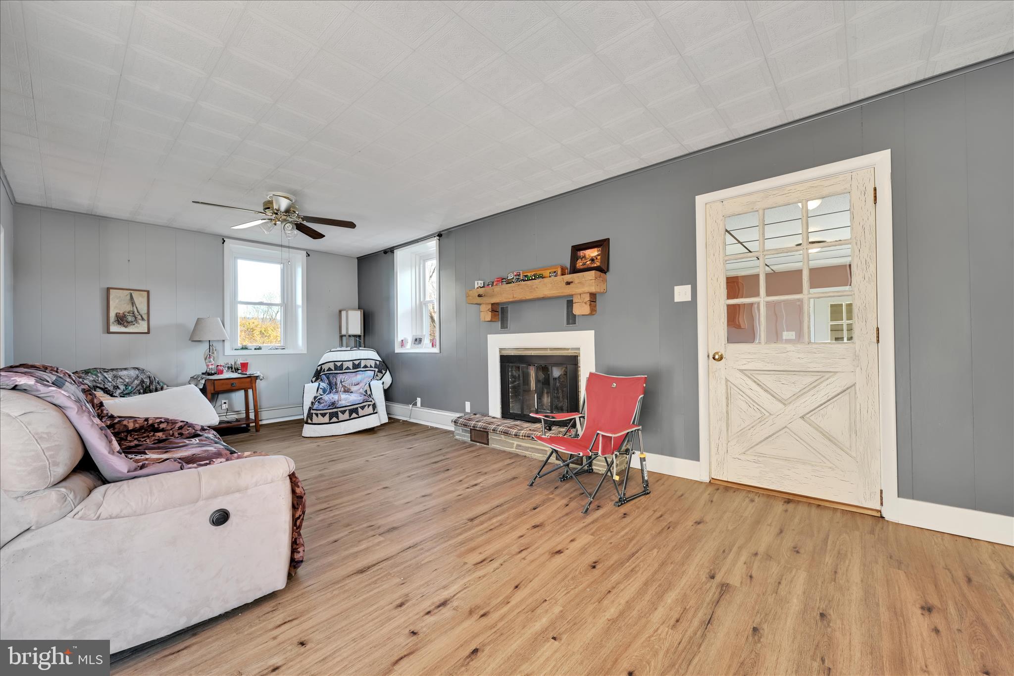 116 Mill Road Bernville, PA 19506 - Photo 8 of 62 a living room with furniture and a fireplace
