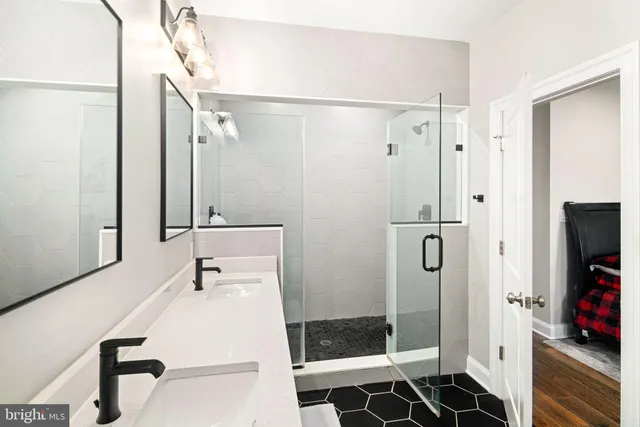 a bathroom with a sink and a mirror