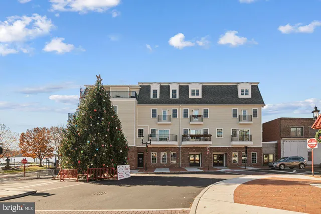 a front view of a building with street view