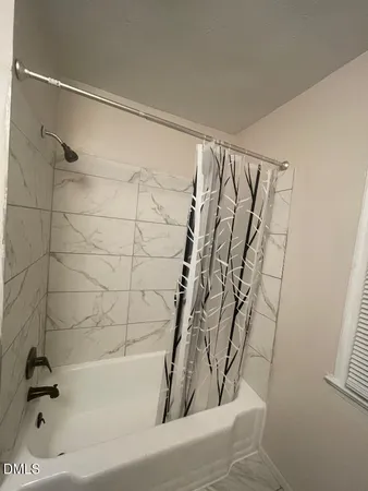 a bathroom with a bathtub