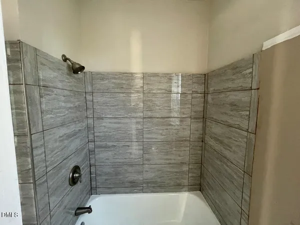 a bathroom with a bathtub