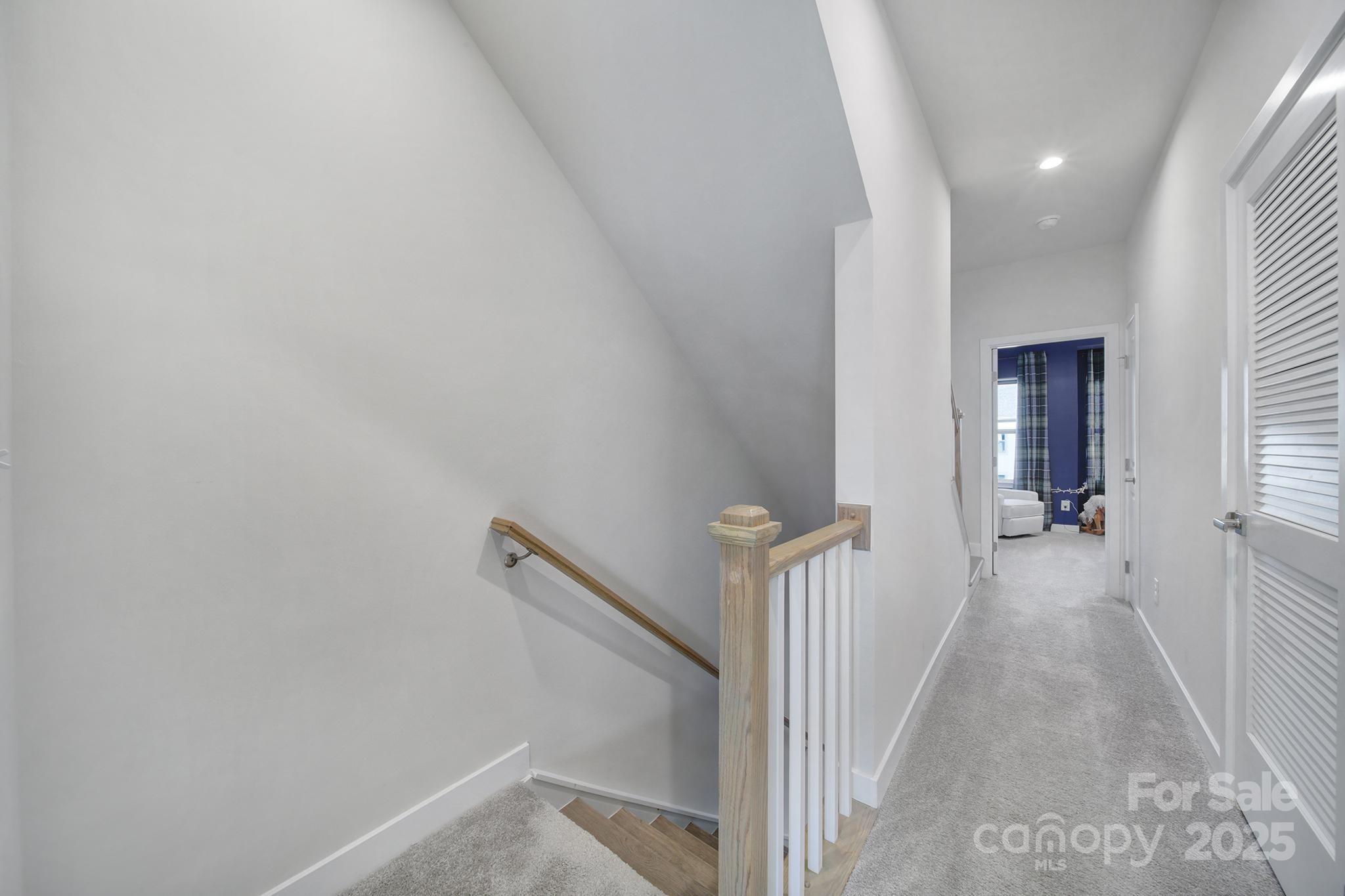 6120 Sta Xing Avenue Charlotte, NC 28217 - Photo 11 of 31 a view of a hallway with a white walls