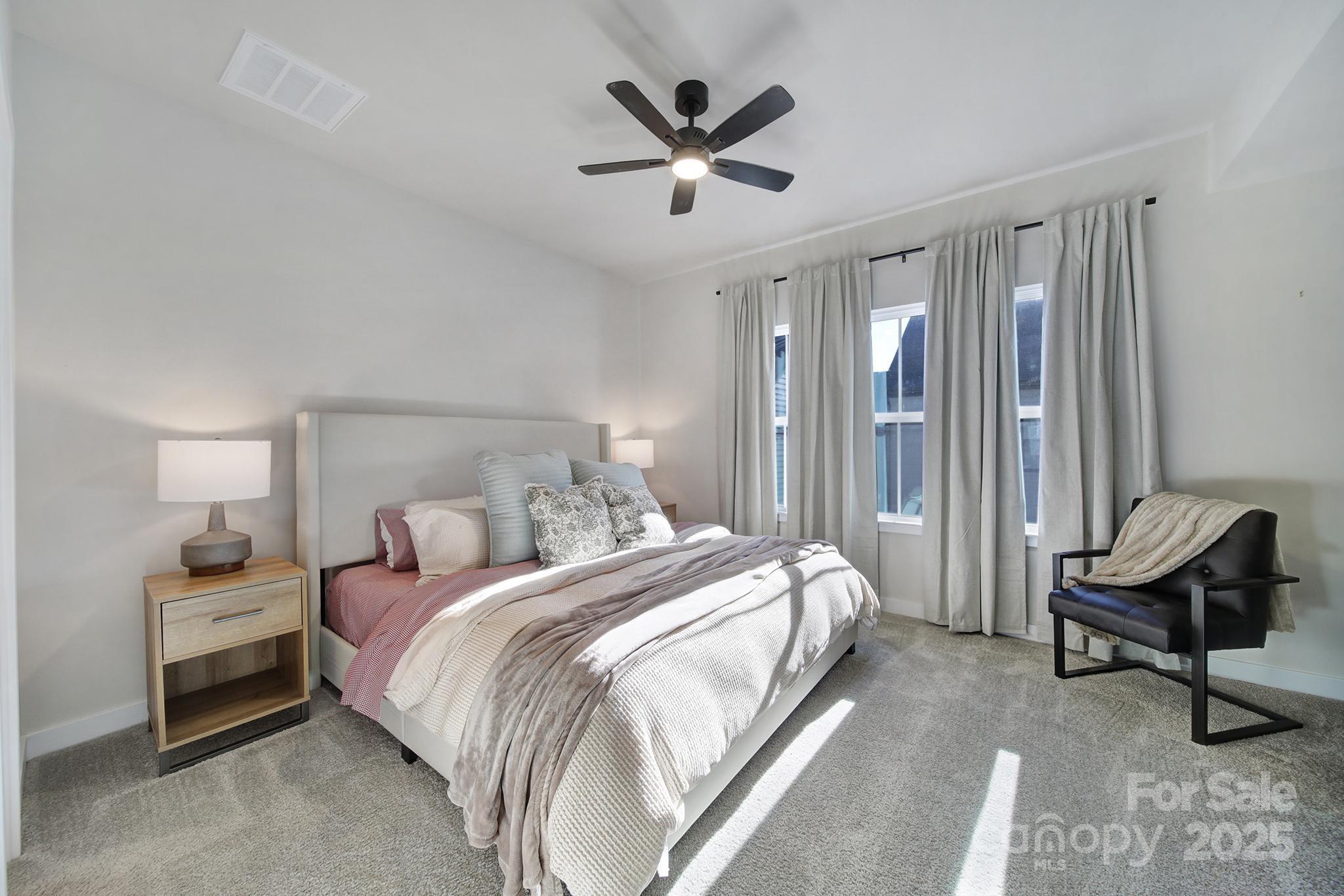 6120 Sta Xing Avenue Charlotte, NC 28217 - Photo 13 of 31 a bedroom with bed and a window