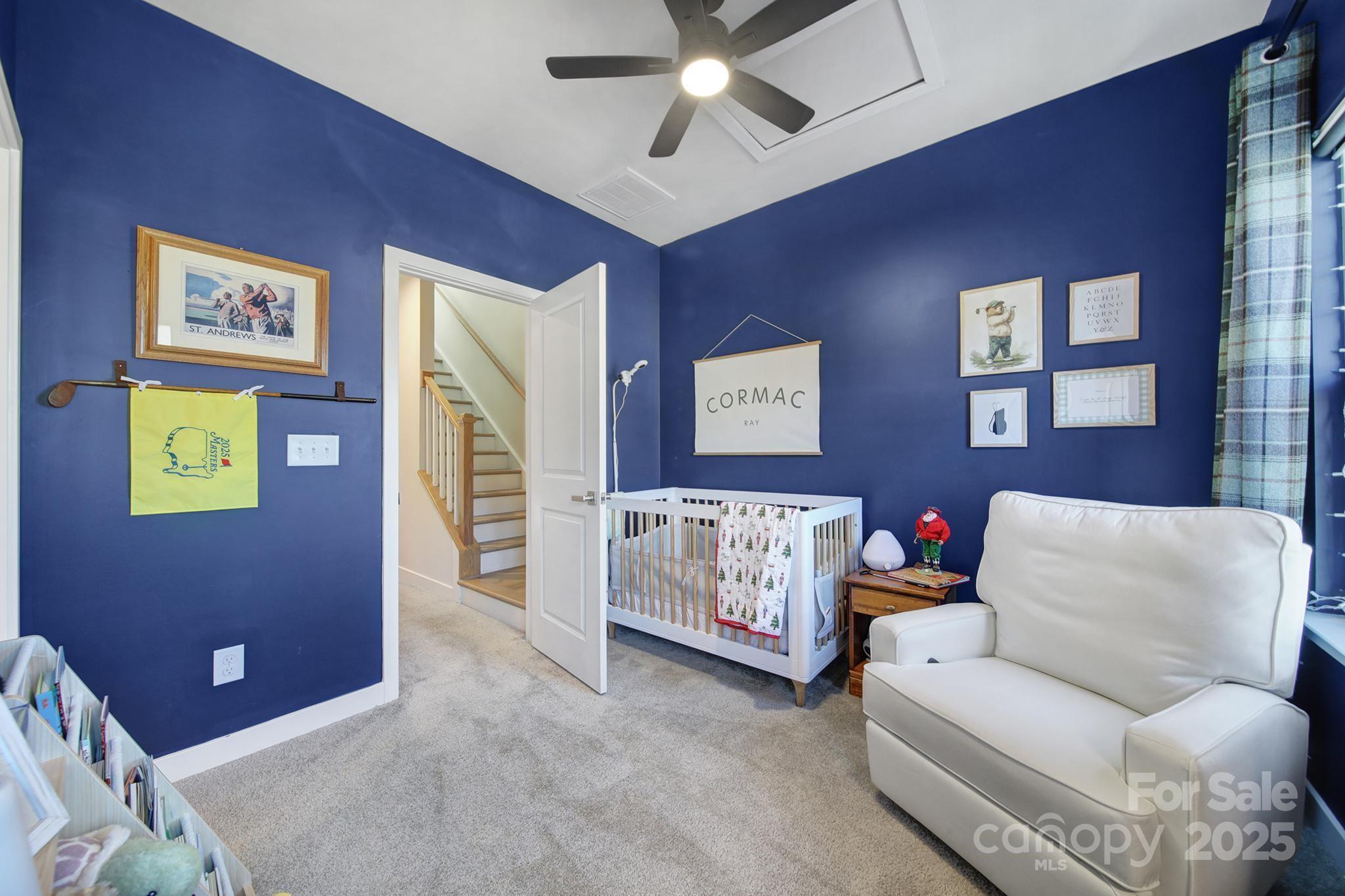6120 Sta Xing Avenue Charlotte, NC 28217 - Photo 18 of 31 a living room with furniture and wall paintings