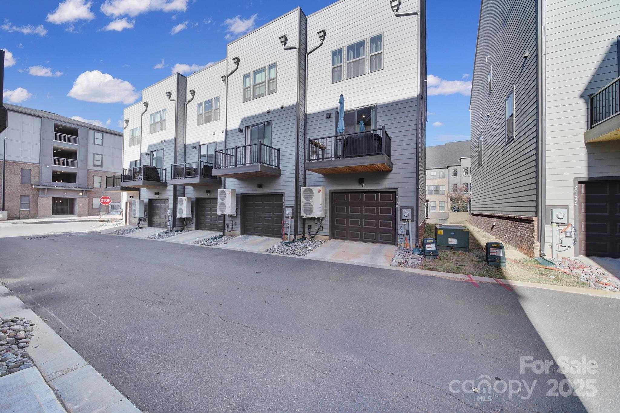 6120 Sta Xing Avenue Charlotte, NC 28217 - Photo 24 of 31 a view of a street with buildings