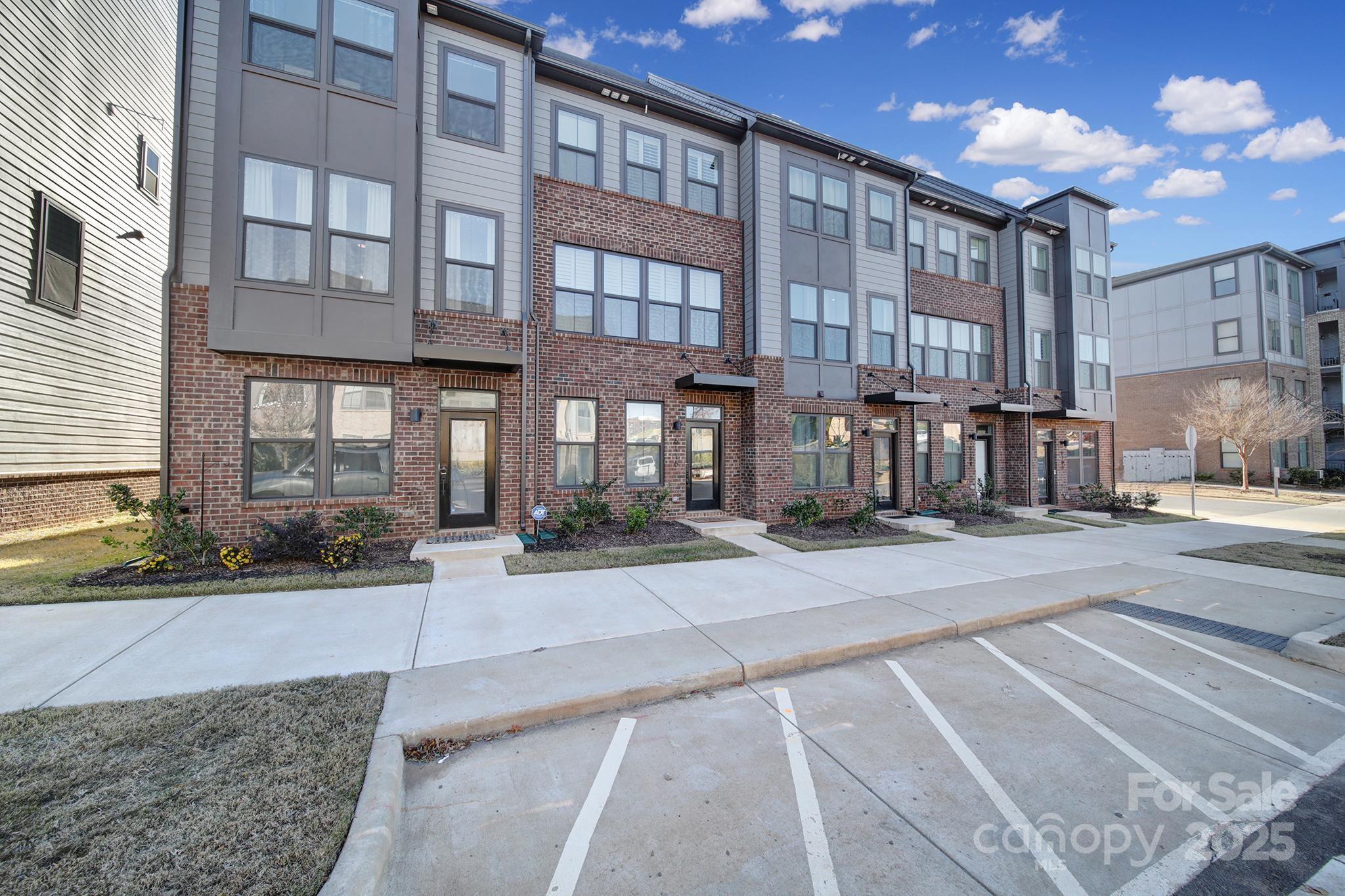 6120 Sta Xing Avenue Charlotte, NC 28217 - Photo 25 of 31 a view of a building with a outdoor space