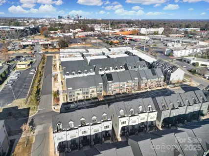 a view of a living room and chandelier