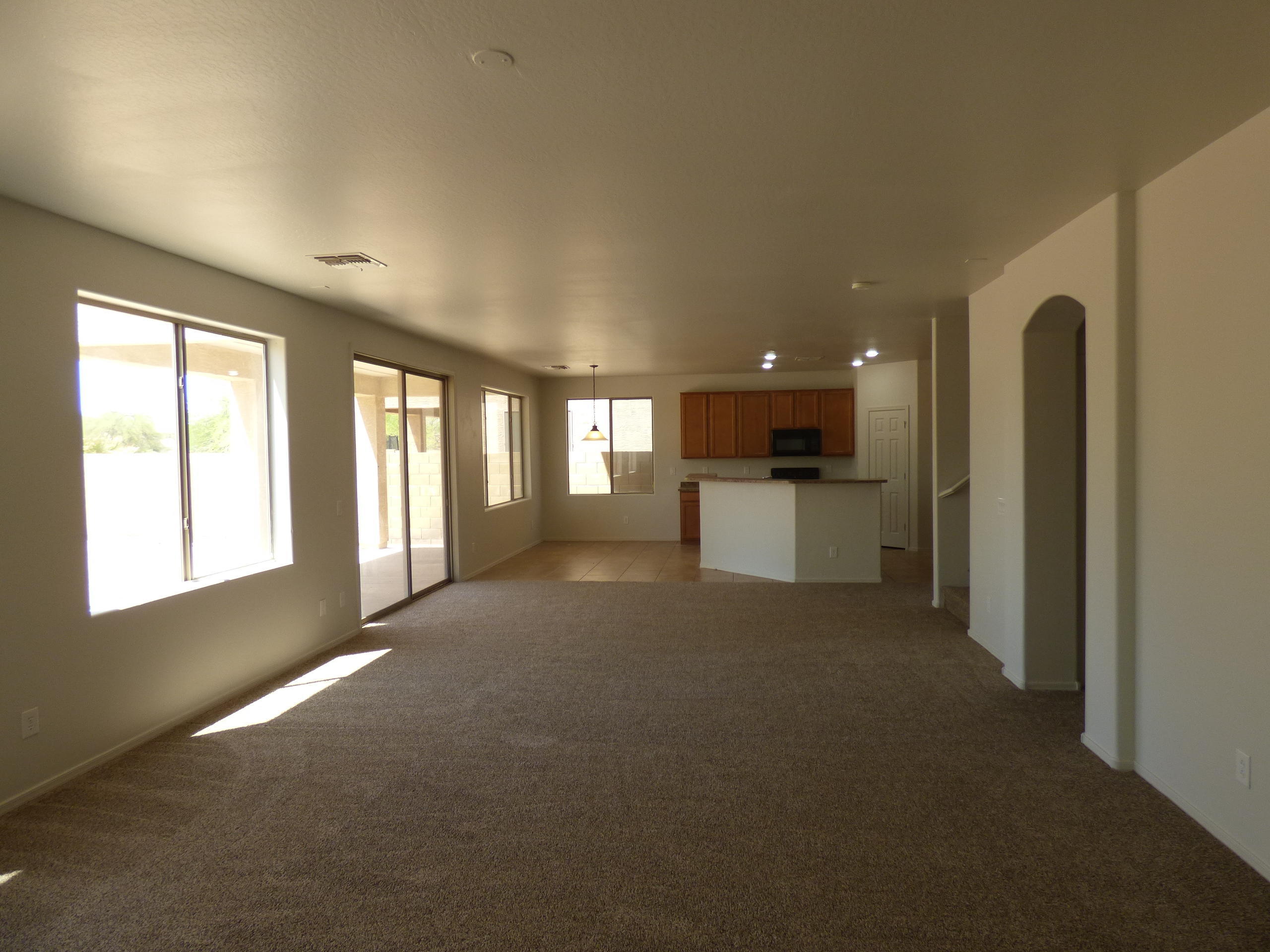 5617 West Carson Road Laveen, AZ 85339 - Photo 12 of 56 a view of a kitchen with a refrigerator a sink and dishwasher