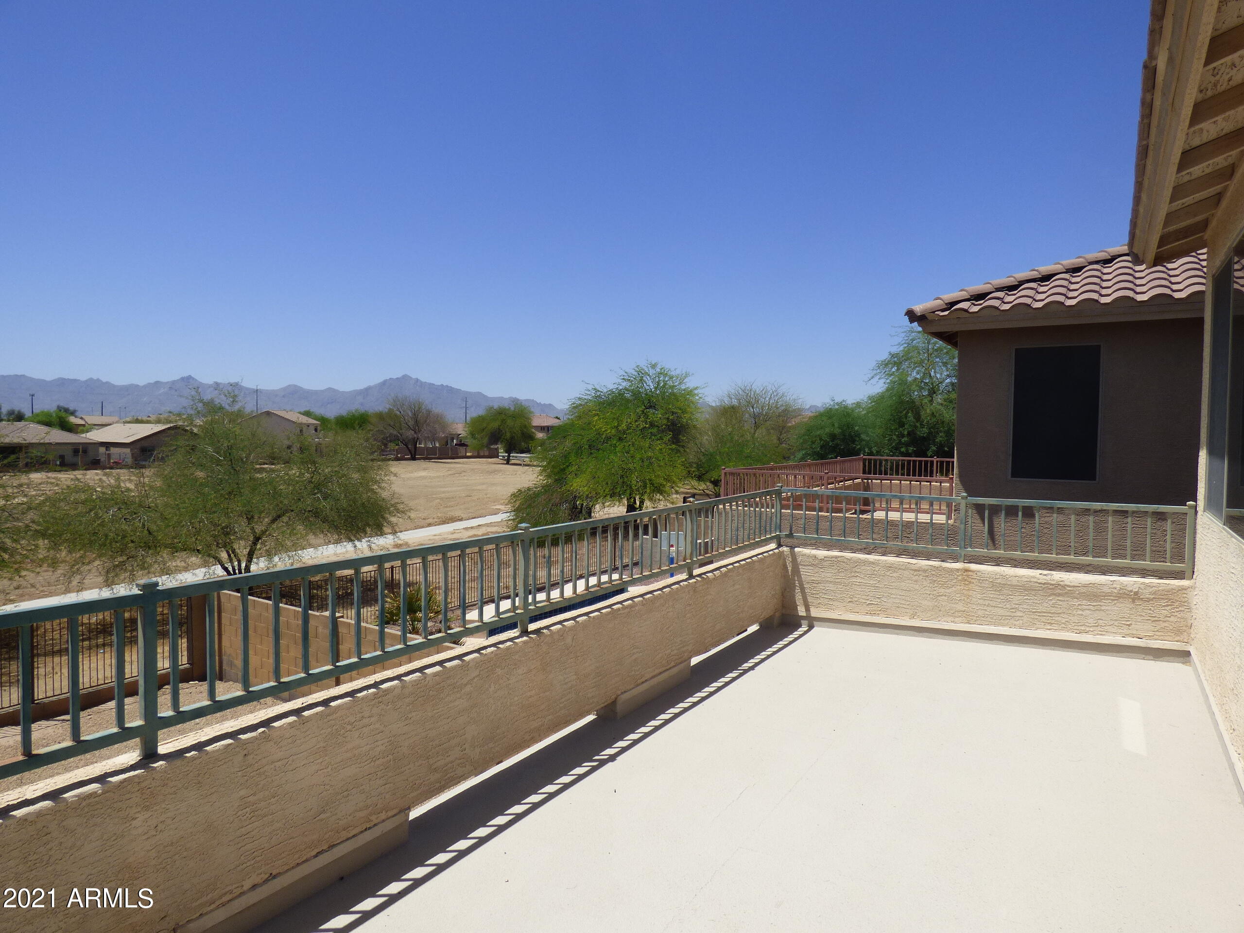 5617 West Carson Road Laveen, AZ 85339 - Photo 29 of 56 a view of balcony with two chairs and a table