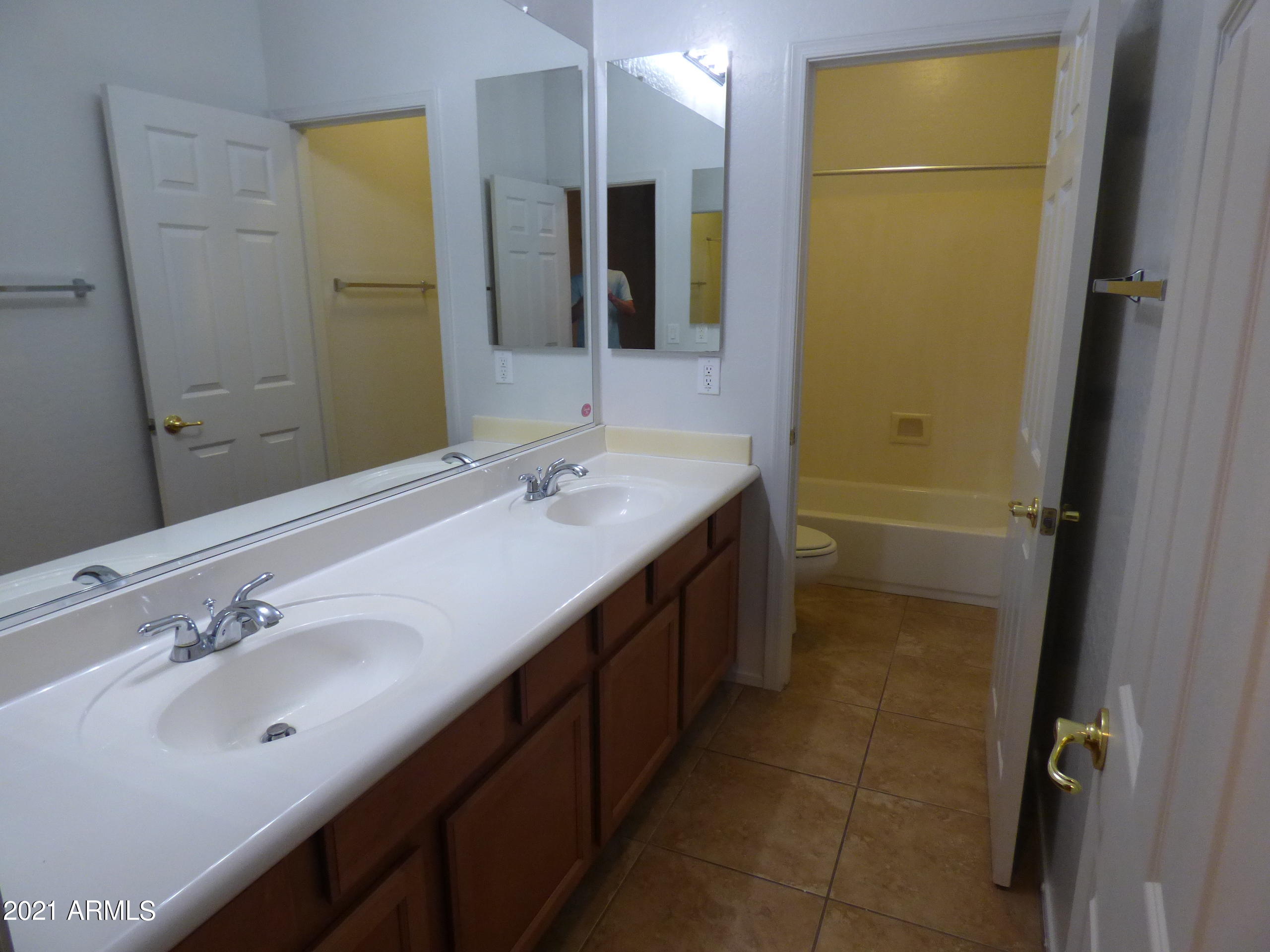 5617 West Carson Road Laveen, AZ 85339 - Photo 48 of 56 a bathroom with a double vanity sink mirror and double