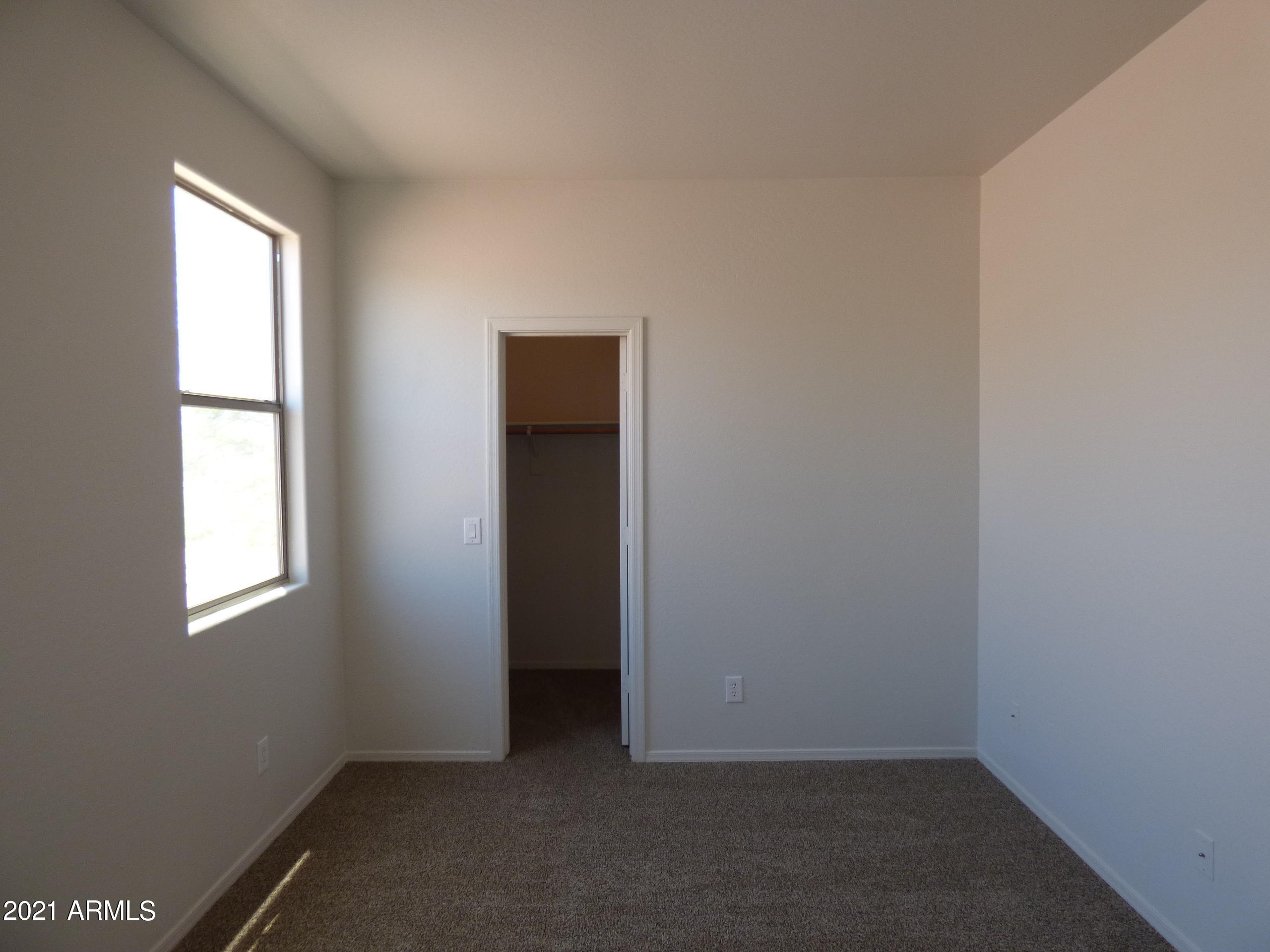 5617 West Carson Road Laveen, AZ 85339 - Photo 49 of 56 an empty room with windows