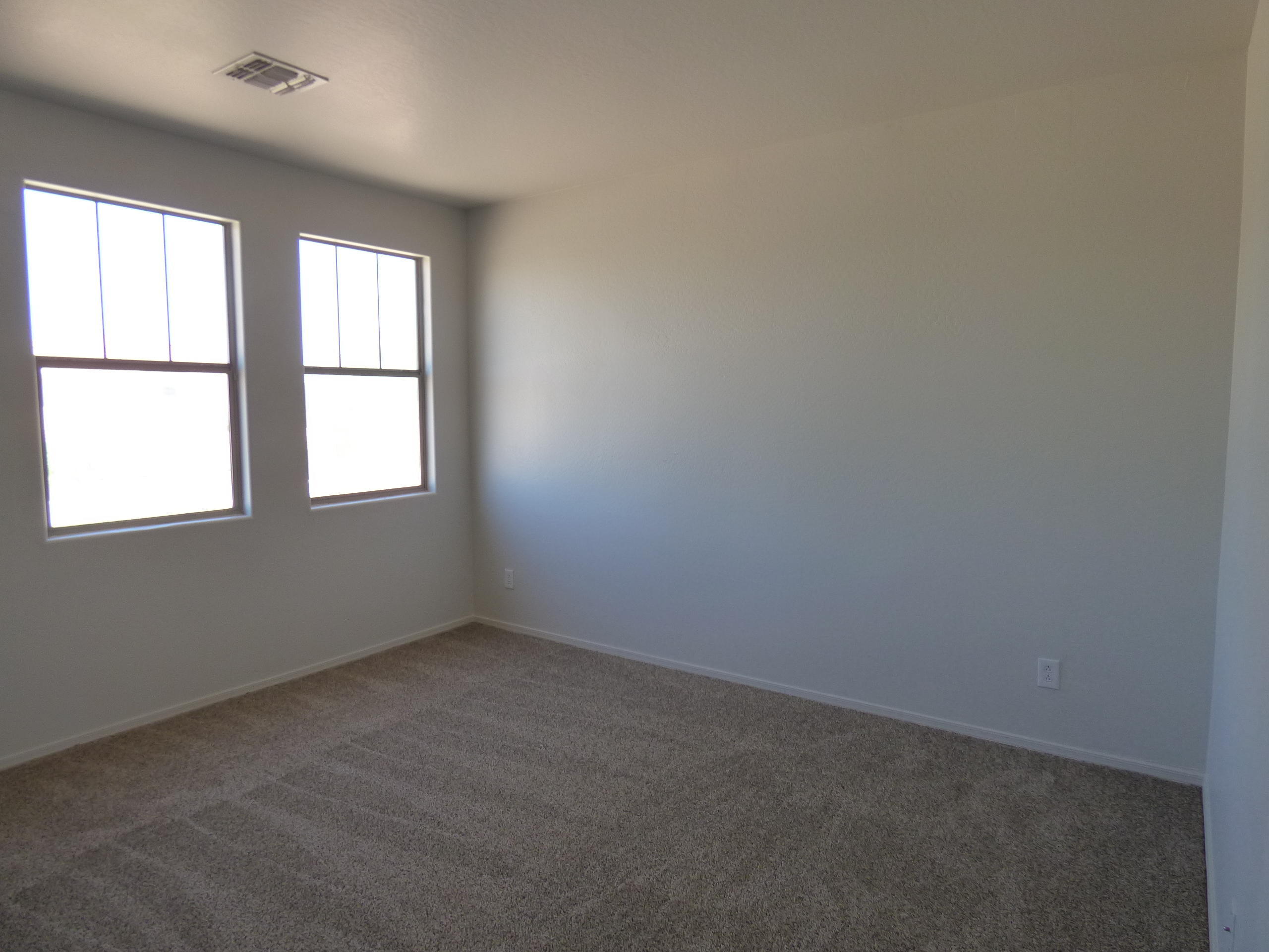 5617 West Carson Road Laveen, AZ 85339 - Photo 51 of 56 an empty room with windows