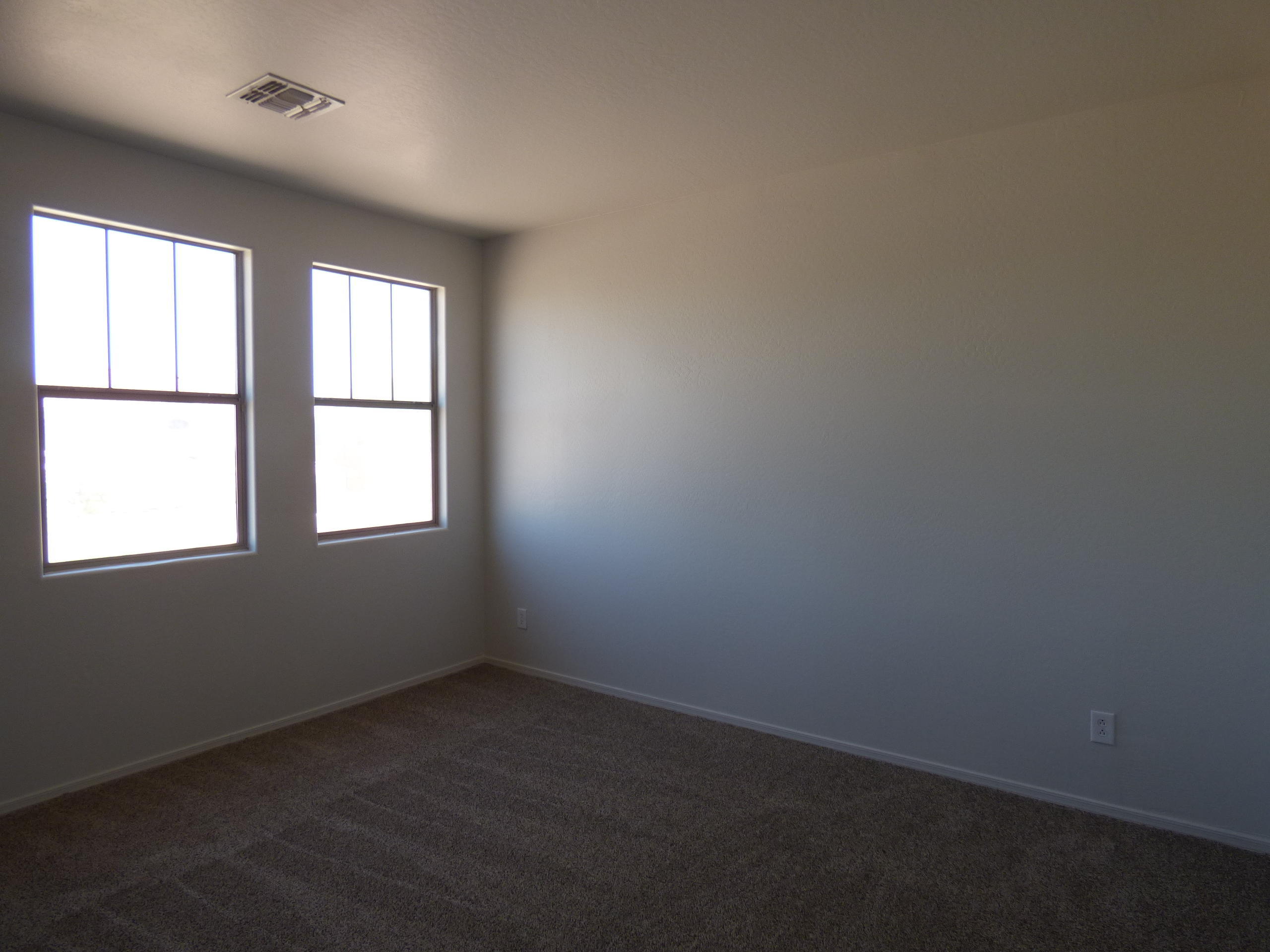 5617 West Carson Road Laveen, AZ 85339 - Photo 52 of 56 an empty room with a window