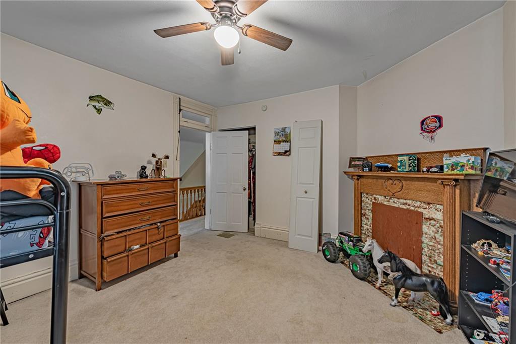 121 Hamilton Avenue Vandergrift, PA 15690 - Photo 19 of 25 a view of room with toys and ceiling fan