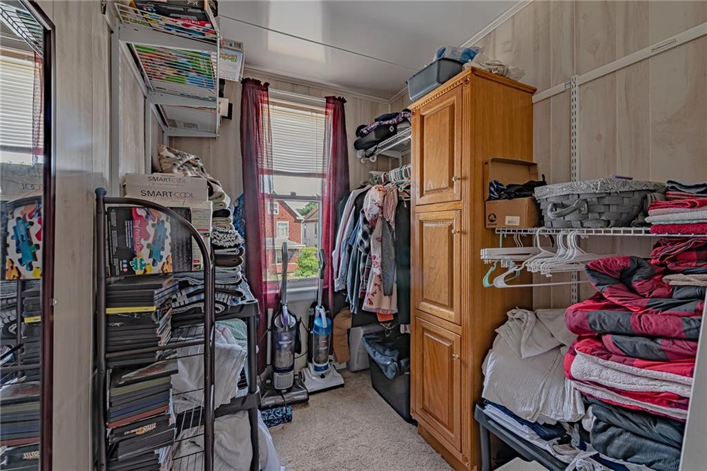 121 Hamilton Avenue Vandergrift, PA 15690 - Photo 20 of 25 a view of walk in closet with clothes