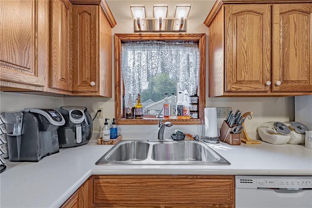 121 Hamilton Avenue Vandergrift, PA 15690 - Photo 10 of 25 a kitchen with sink and cabinets