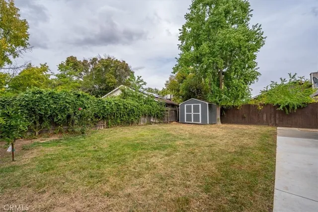 a house with trees in front of it