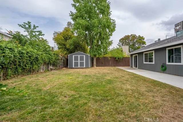a house with trees in front of it