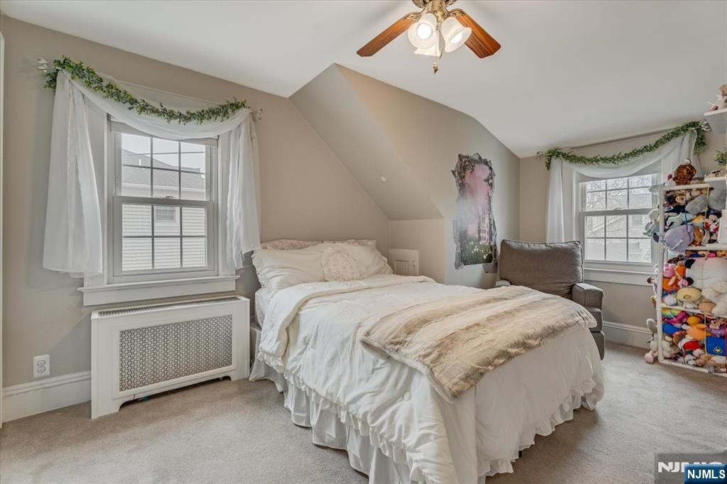 27 Prospect Avenue Pompton Plains, NJ 07444 - Photo 16 of 26 a bedroom with a bed and a window