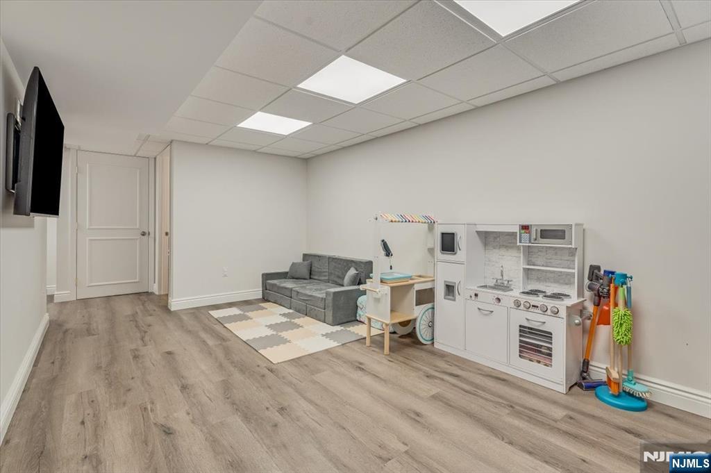 27 Prospect Avenue Pompton Plains, NJ 07444 - Photo 19 of 26 a view of a workspace with furniture and wooden floor