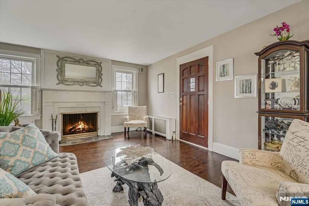 27 Prospect Avenue Pompton Plains, NJ 07444 - Photo 2 of 26 a living room with furniture and a fireplace