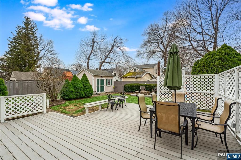 27 Prospect Avenue Pompton Plains, NJ 07444 - Photo 23 of 26 a view of a wooden chairs and table on the wooden floor