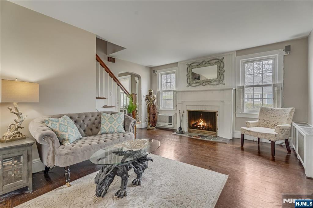 27 Prospect Avenue Pompton Plains, NJ 07444 - Photo 3 of 26 a living room with furniture and a fireplace