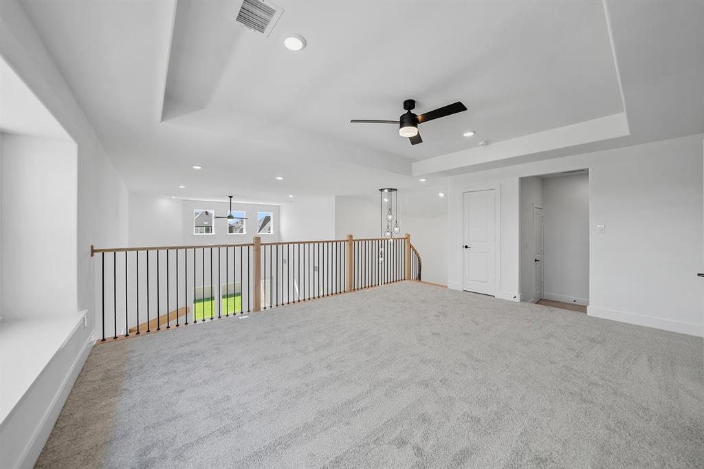587 Mayfair Lane Frisco, TX 75033 - Photo 24 of 37 a view of an empty room with a window